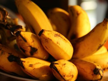 selective focus photography of ripped bananas